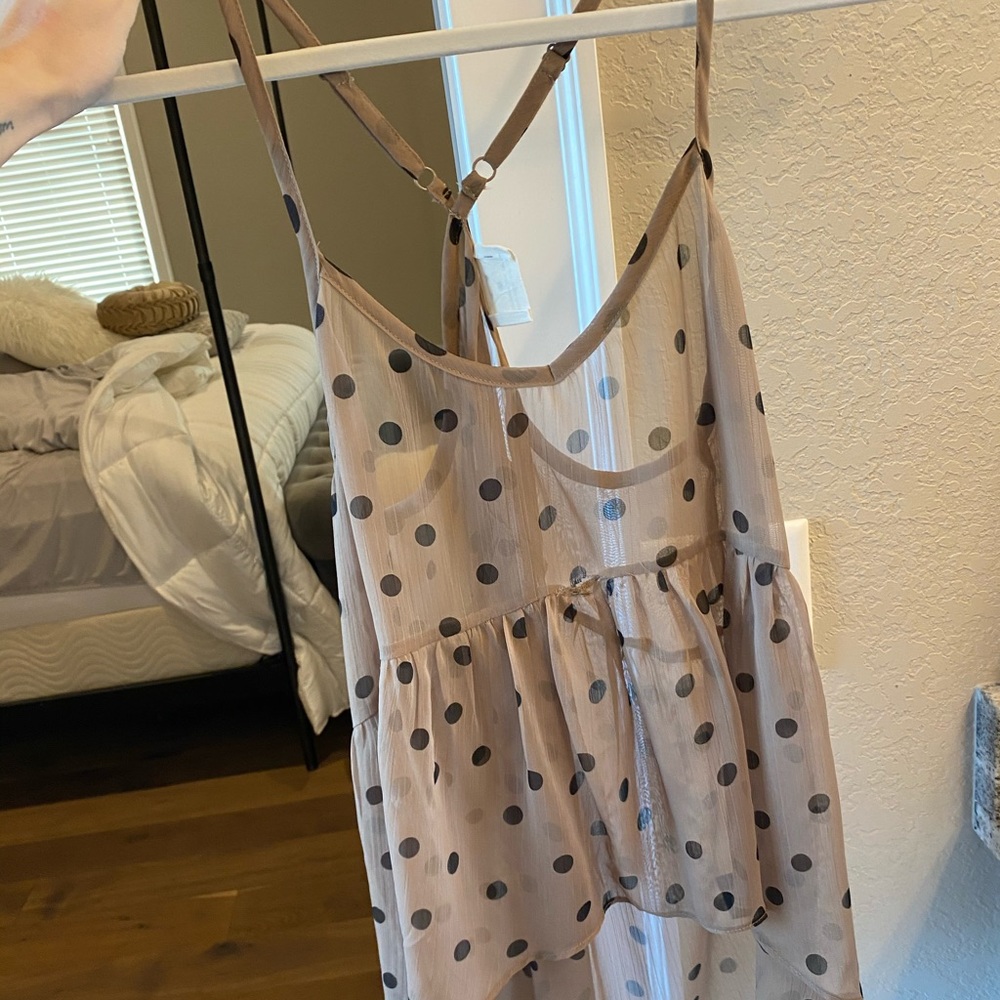 Tan with spots tank